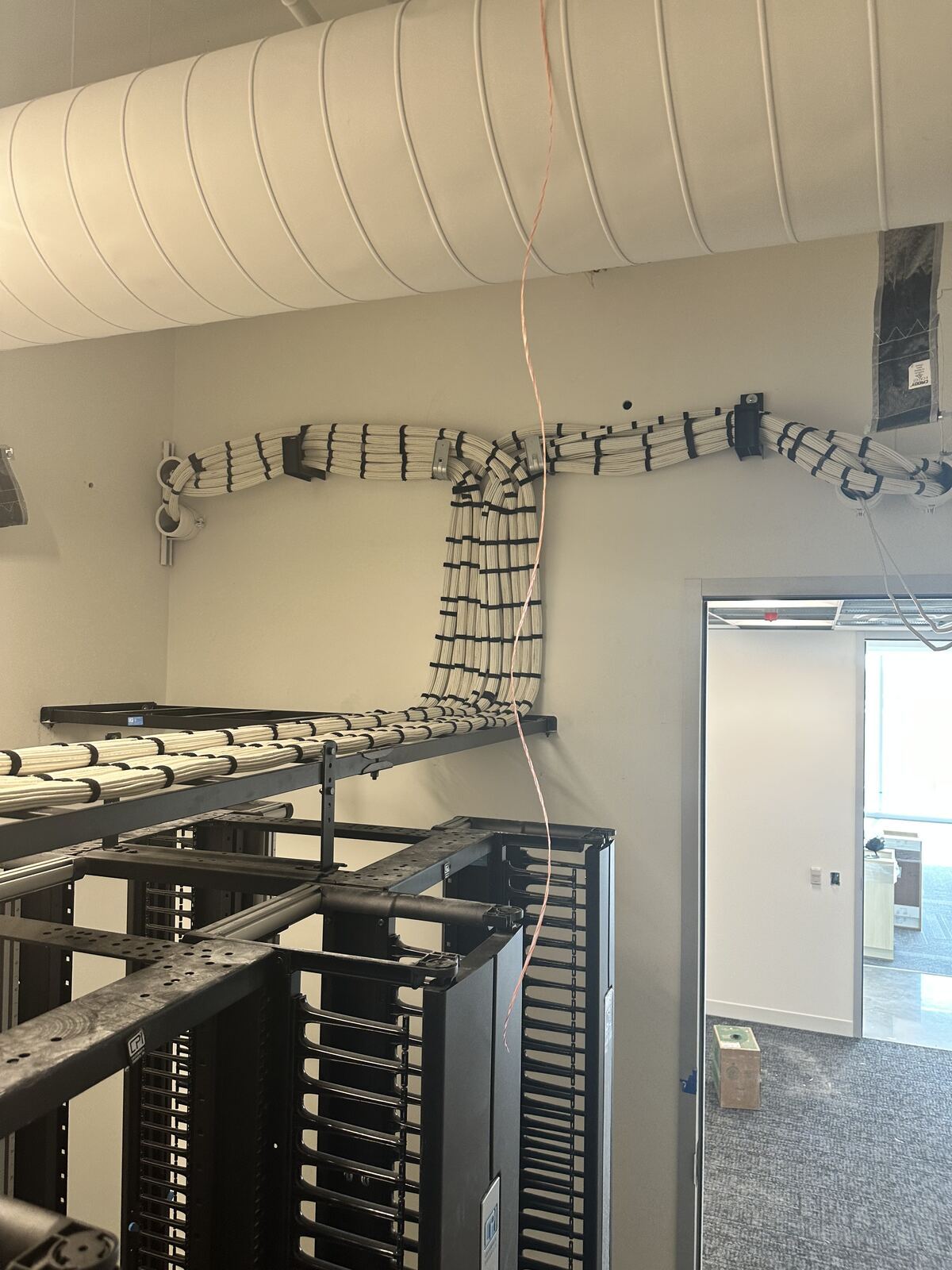 Cat6 cable bundles routed and dressed into a server rack